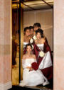 San Jose Wedding Photography - Bride & Bridesmaids in Elevator